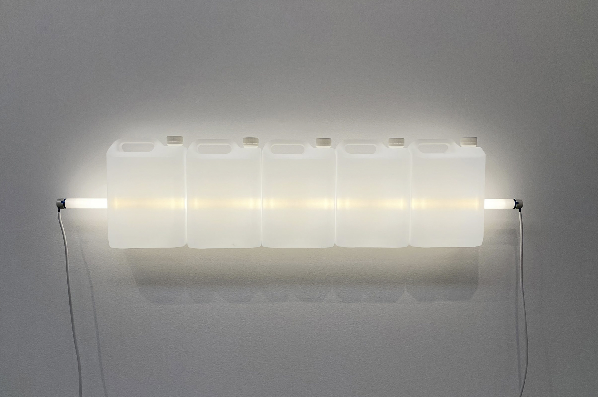Bill Culbert, Translucent, 2015 plastic bottle, fluorescent tube & fittings 30 x 122 x 14.5 cm